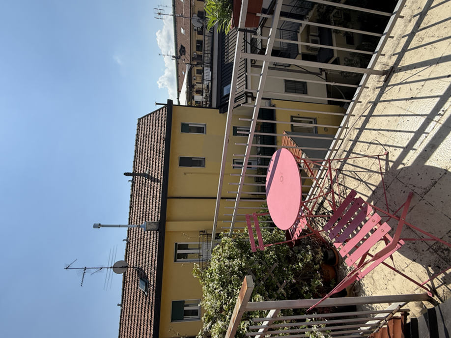 FONDAZIONE PRADA/BOCCONI, MANSARDA con balcone